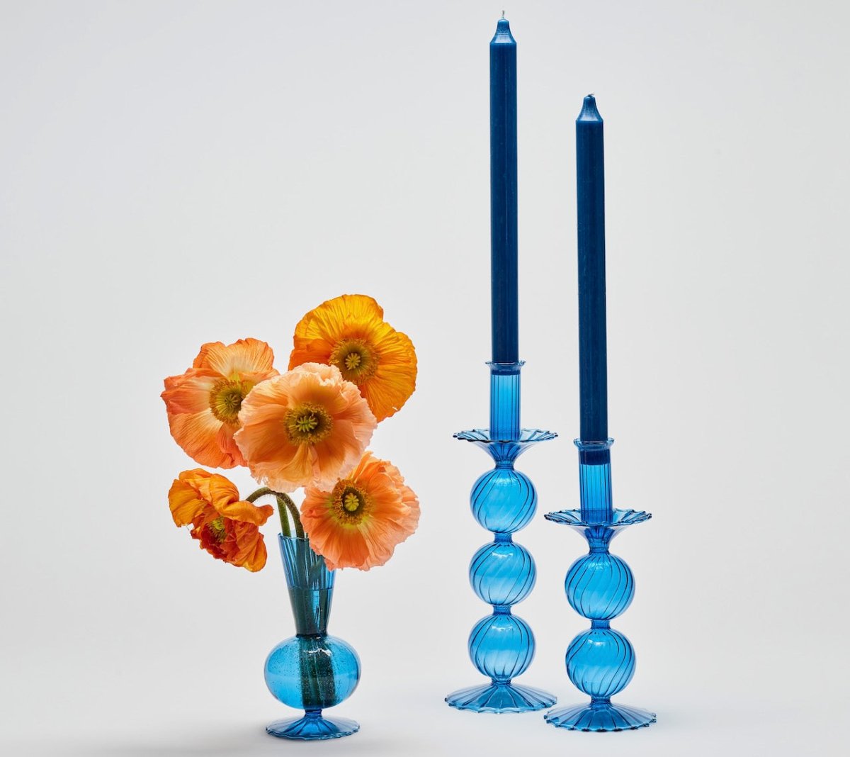 Kim Seybert BUD VASE: TESS S3 - Blue Glass Bud Vases Set at Fig Linens and Home 3 - Shown with Candle Sticks