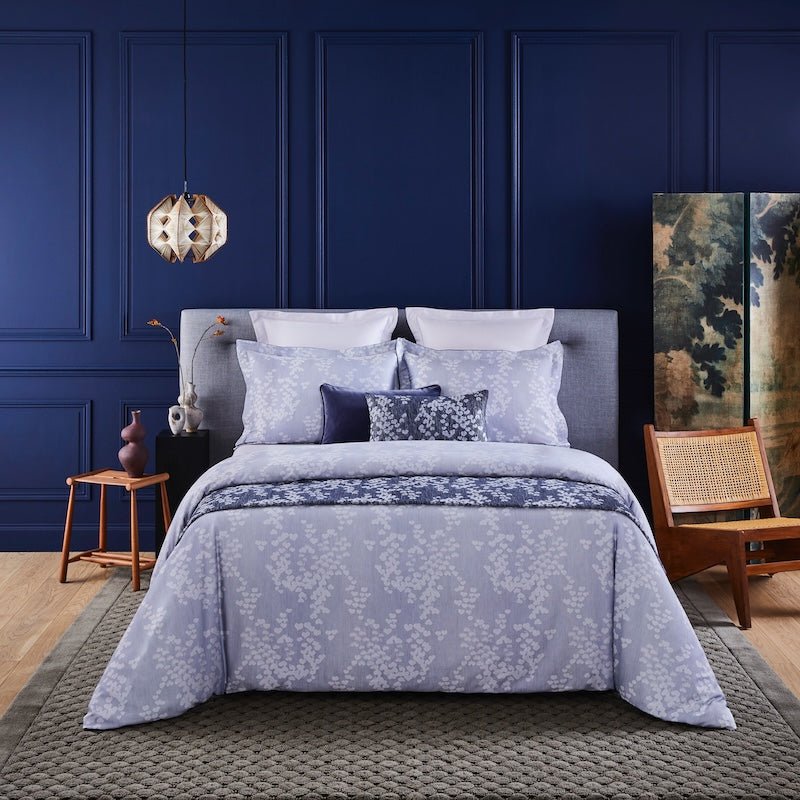 Yves Delorme Estampe Bedding - Silver and Blue Jacquard Bed Set shown in Blue Bedroom - View 1