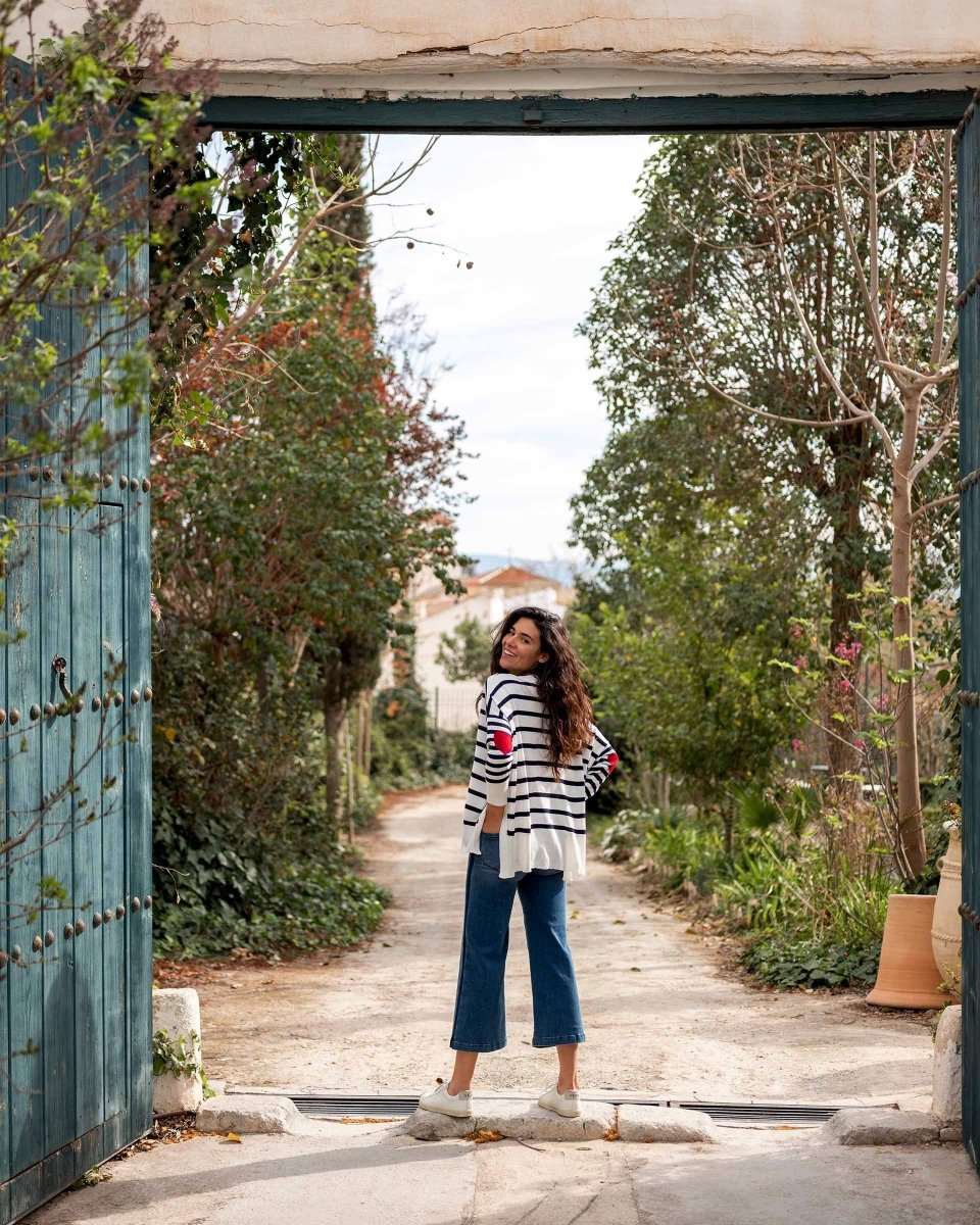 Amour Navy Striped Sweater by Mer Sea - Lifestyle Photo in Garden