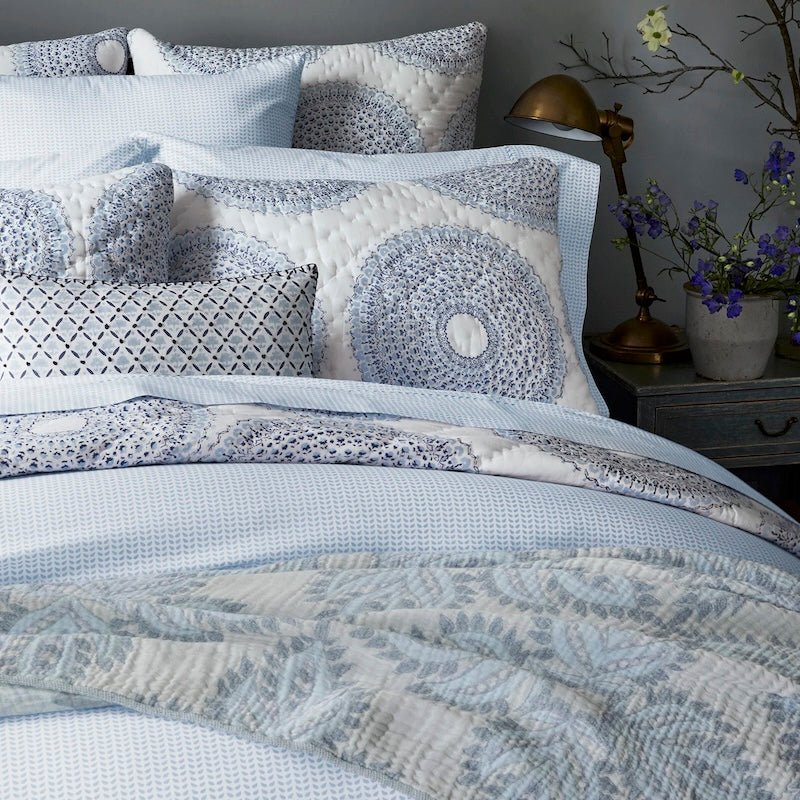 John Robshaw Textiles - Lifestyle Photo of Cinde Light Indigo Blue on Bed with Quilts and Shams 1