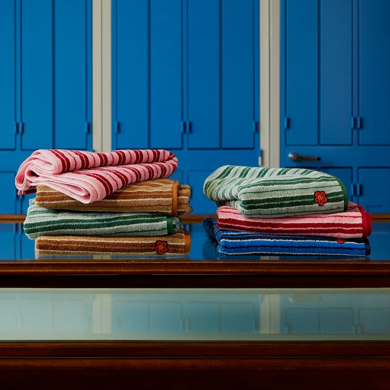 Lifestyle photograph of Kenzo Home K Club Towels at Fig Linens and Home