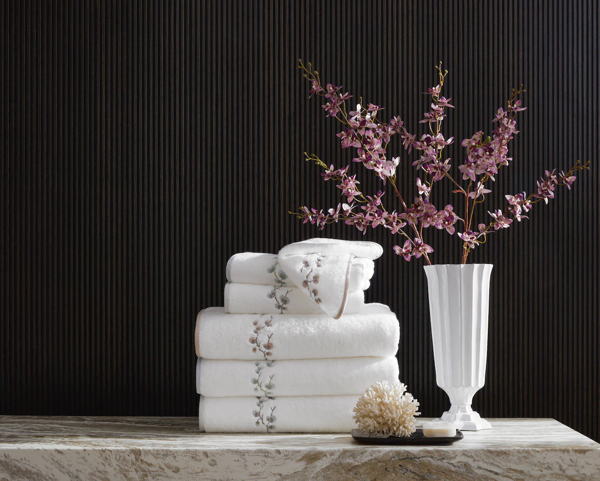 Matouk Jasmine Giza Terry Towels in a Stack - Lifestyle 1 at Fig Linens and Home