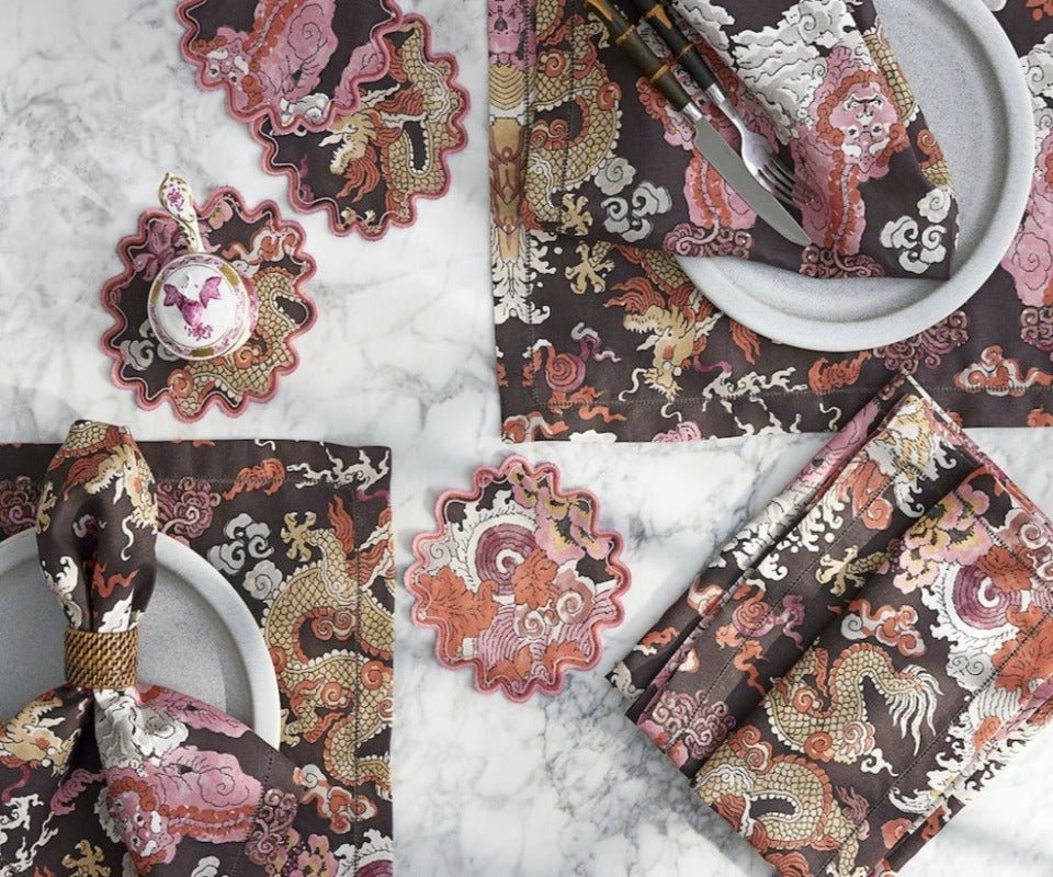 Matouk Schumacher Magic Mountain Cocktail Napkins Chocolate Persimmons - Shown on Table with Plates