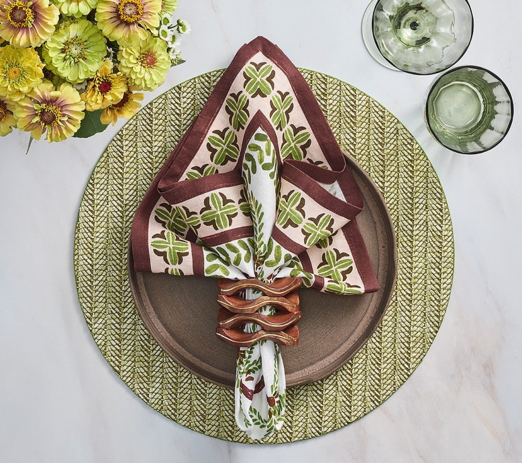 Oasis Napkin in Ivory Green & Brown Set of 4 by Kim Seybert shown on table