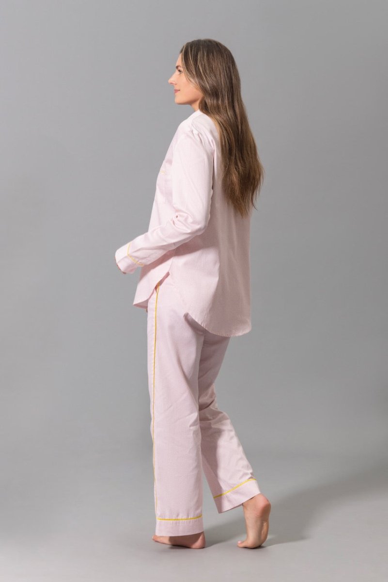 Matouk Jasper Pajamas in Peony Pink with Yellow Piping - Shown on Model - Side at Fig Linens & Home