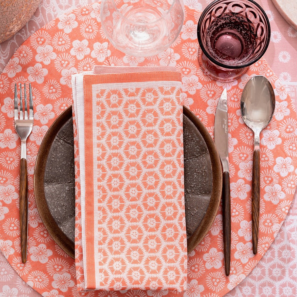 Wagara Pink Round 15" Coated Placemat by Le Jacquard Français - 9at Fig Linens and Home - 5