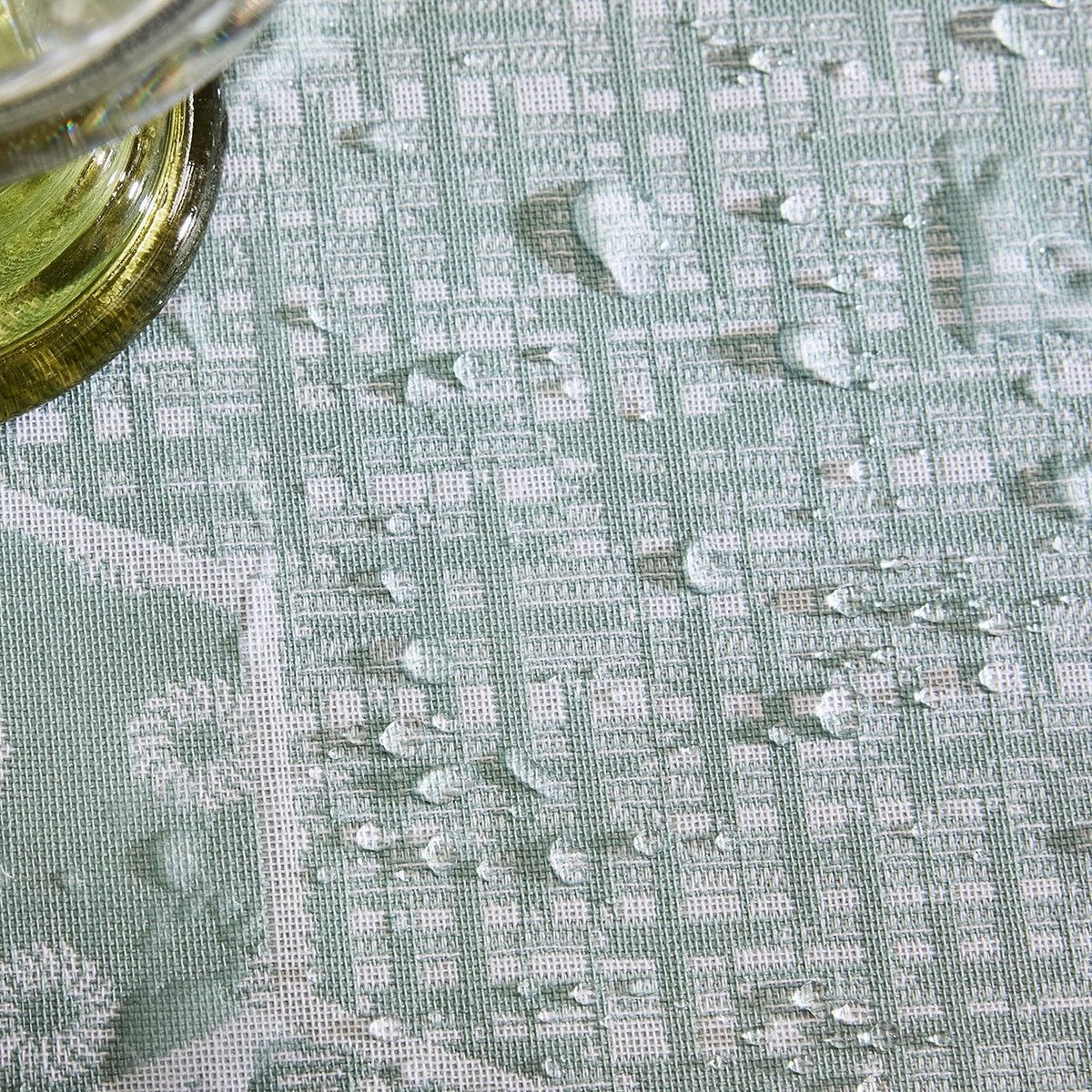 Wagara Green 59" x 86" Coated Tablecloth by Le Jacquard Français - 9at Fig Linens and Home - 1