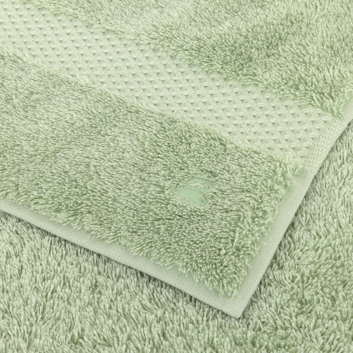 Logo Detail of Etoile Amande Bath by Yves Delorme | Terry Towels at Fig Linens and Home