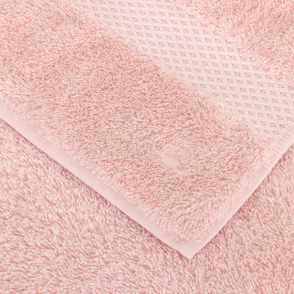 Towels Logo Detail - Etoile Petale Bath by Yves Delorme at Fig Linens and Home