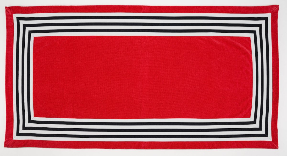 Abyss Cannes Beach Towel in Viva Magenta 579 at Fig Linens and Home - Pool Towel View 2