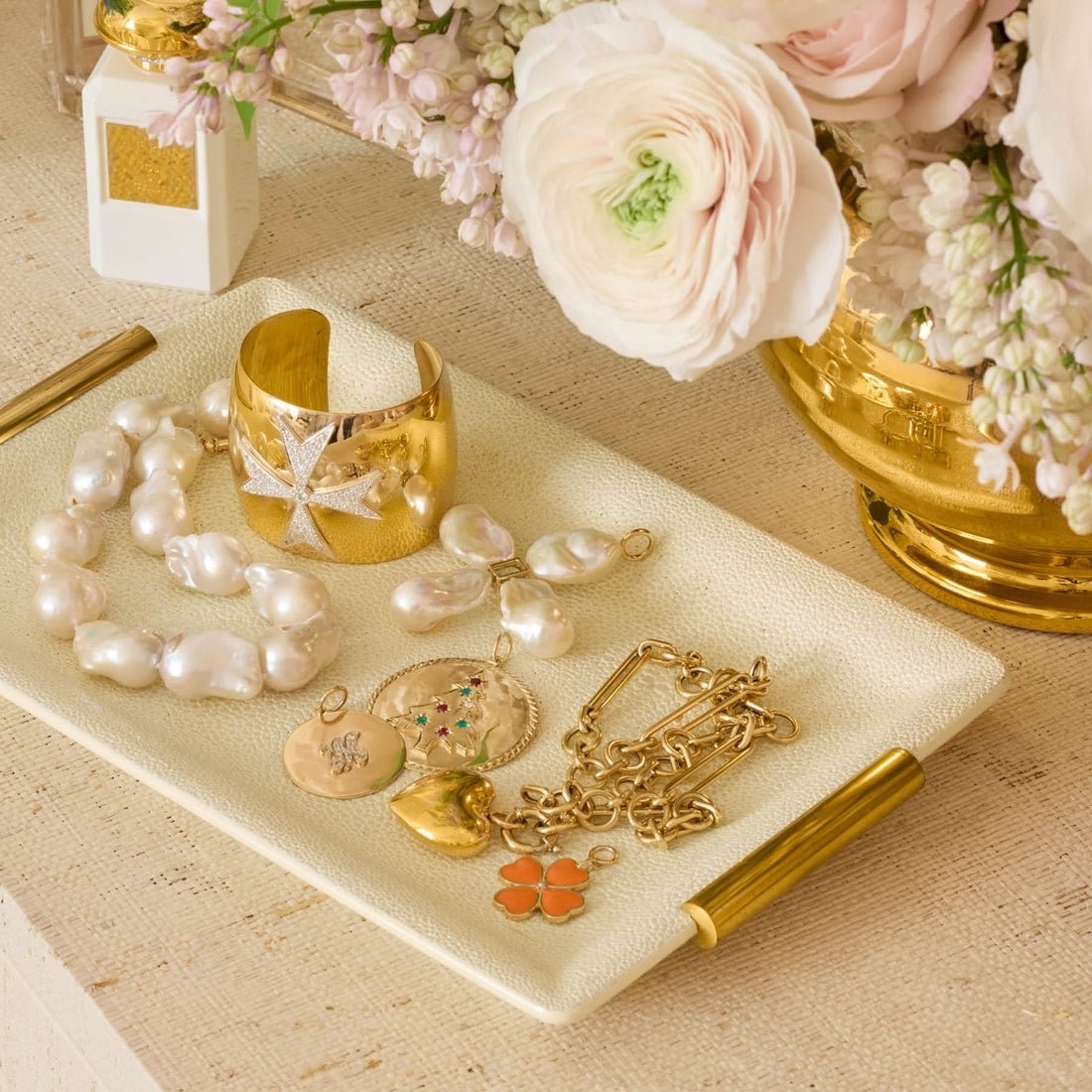 Shagreen Small Vanity Tray in Cream by AERIN Lifestyle with Flowers and Jewelry