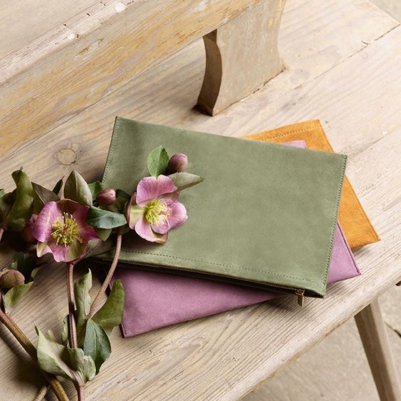 AERIN Suede Pouches | Lifestyle of Flat Clutch Bags at Fig Linens and Home