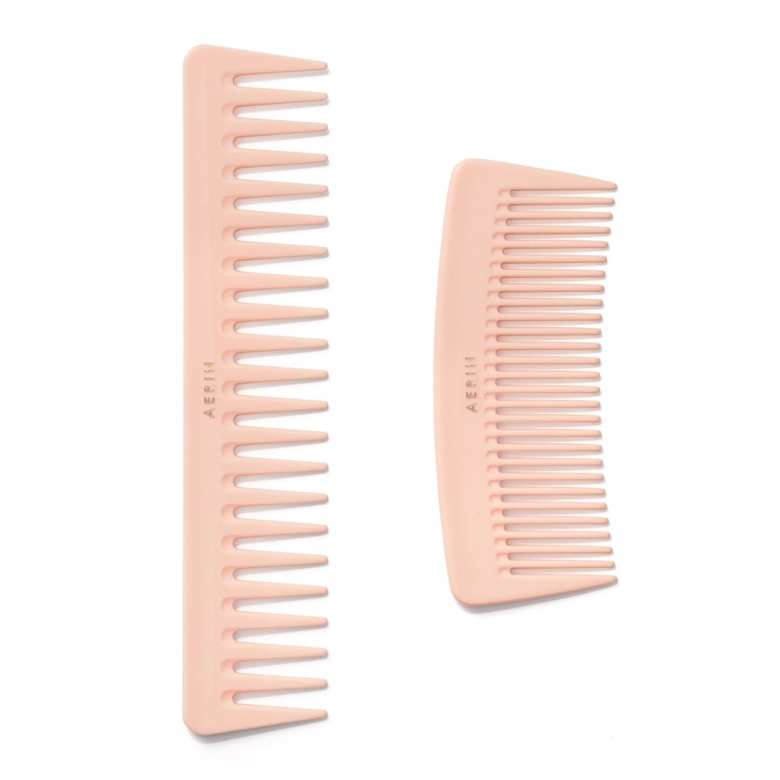 Travel Pink Pastel Comb by AERIN shown with Larger comb