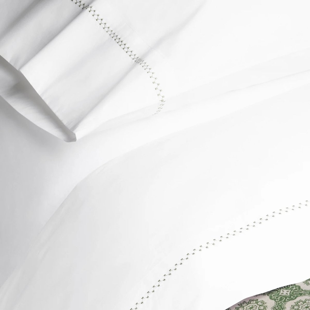 Anketi Sage Green Sheets on a Bed - John Robshaw Sheets at Fig Linens and Home