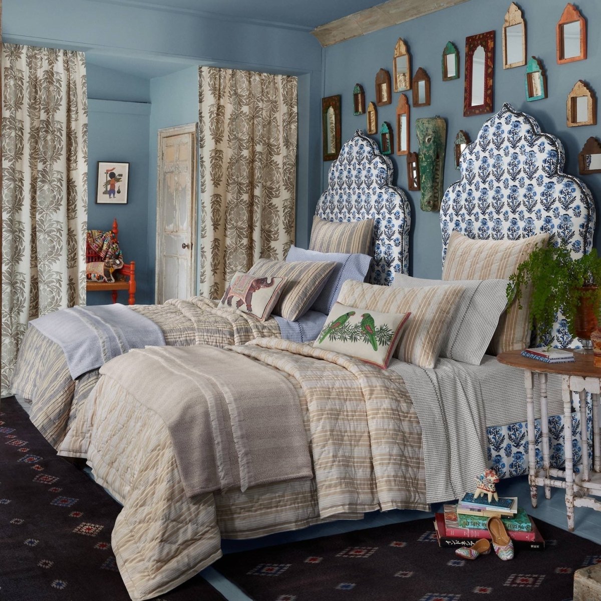 Darika Indigo Quilt by John Robshaw at Fig Linens and Home - Lifestyle Image on Bed