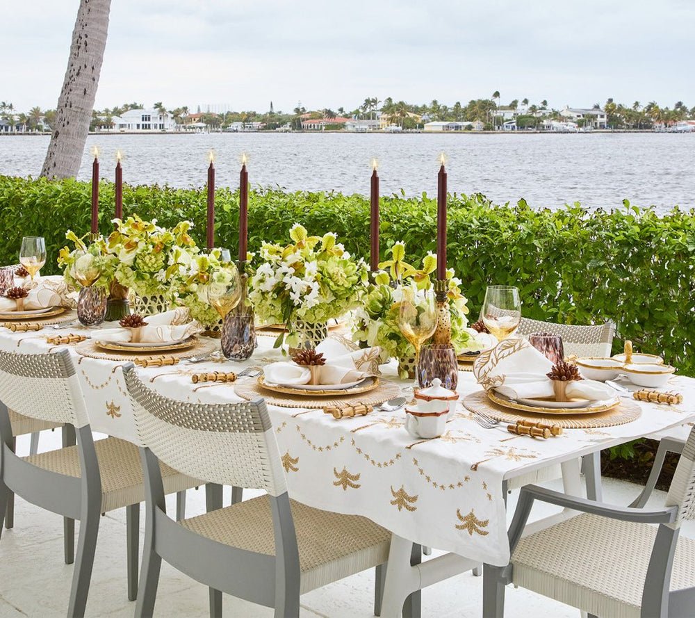 Kim Seybert Embroidered Palm Tablecloth in White Natural & Gold at Fig Linens and Home - Lifestyle 1