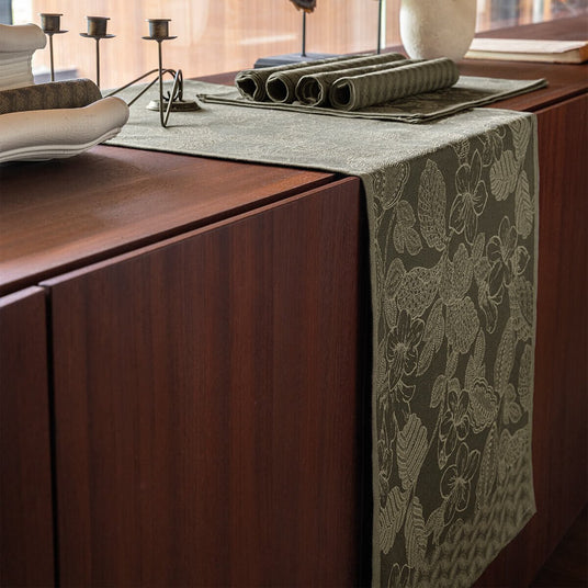 Sulawesi Green Table Runner by Le Jacquard Français at Fig Linens and Home - Lifestyle