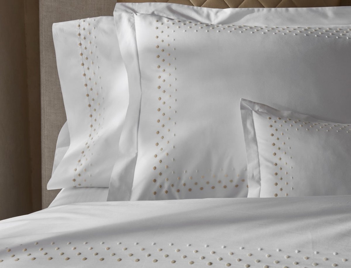 Pillow Shams and Cases on Bed - Matouk Dorothy Swiss Dot Embroidery Bedding