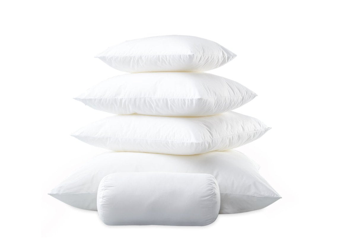 Libero Decorative Pillows in Down-Alternative by Matouk - Shown in a stack at Fig Linens and Home 1