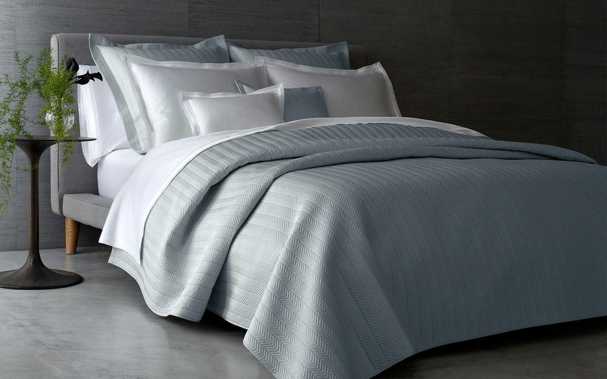 Matouk Netto Quilts & Shams shown on Bed at Fig Linens and Home