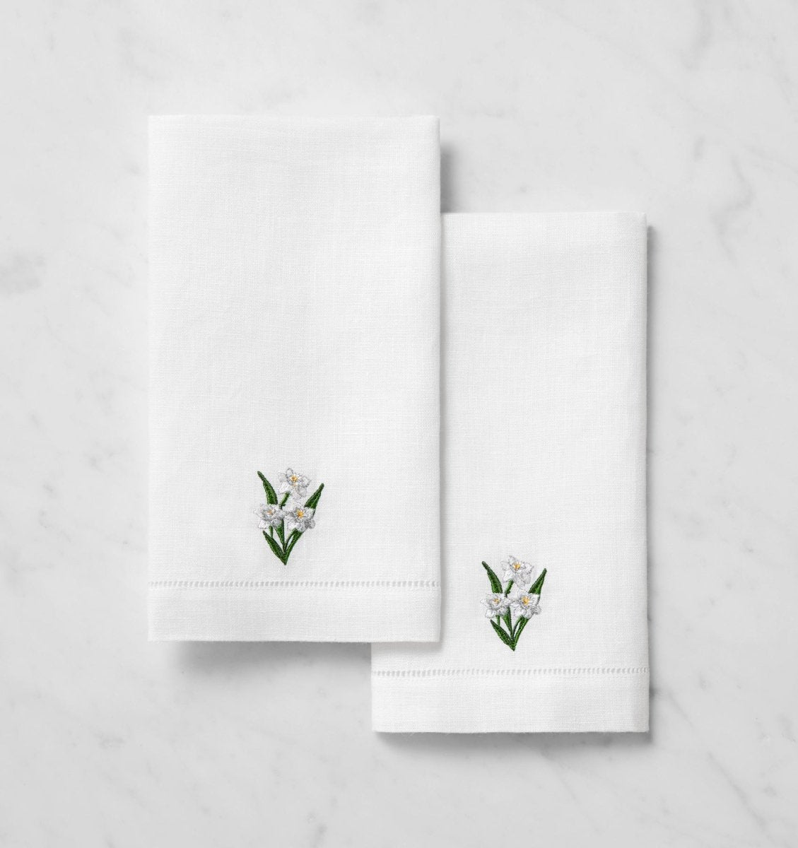 SFERRA Linens FIORENZA BIRTHFLOWER GUEST TOWEL DECEMBER NARCISSYS COMP at Fig Linens and Home