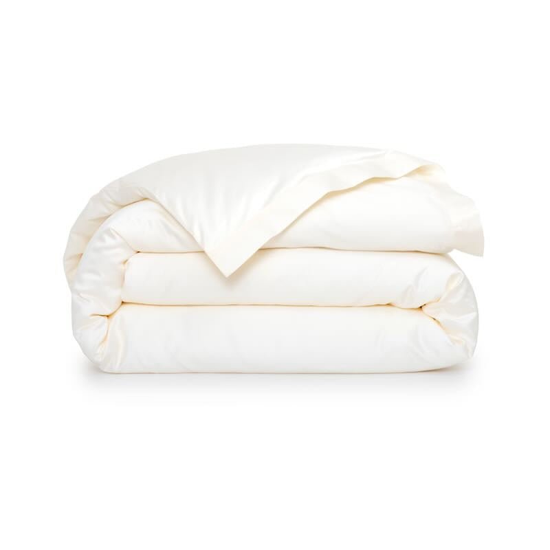 Folded Prodige Crème Bedding by Yves Delorme Couture at Fig Linens and Home