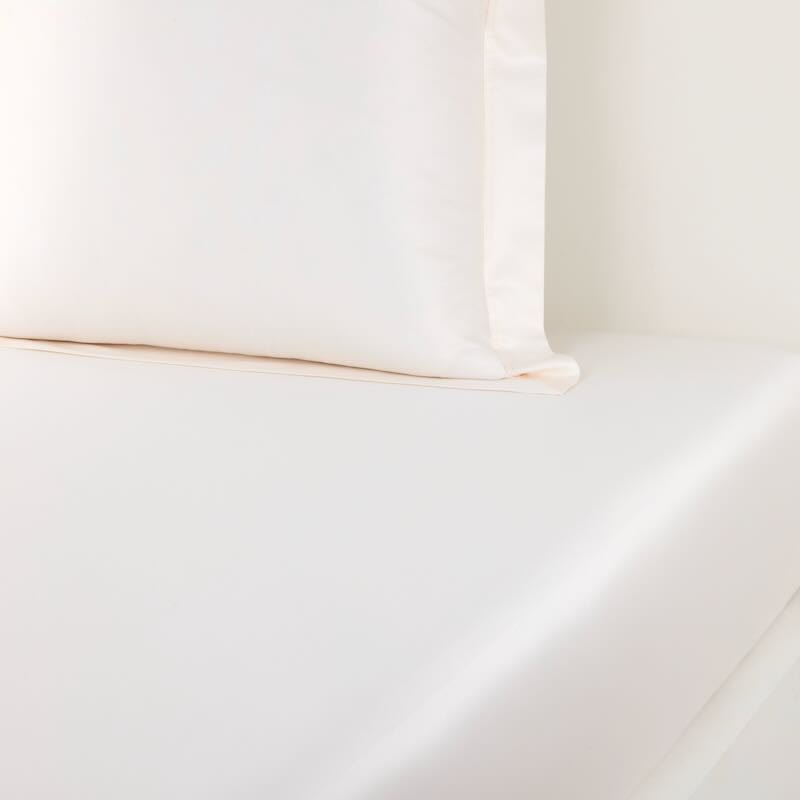 Fitted Prodige Crème Bedding by Yves Delorme Couture at Fig Linens and Home