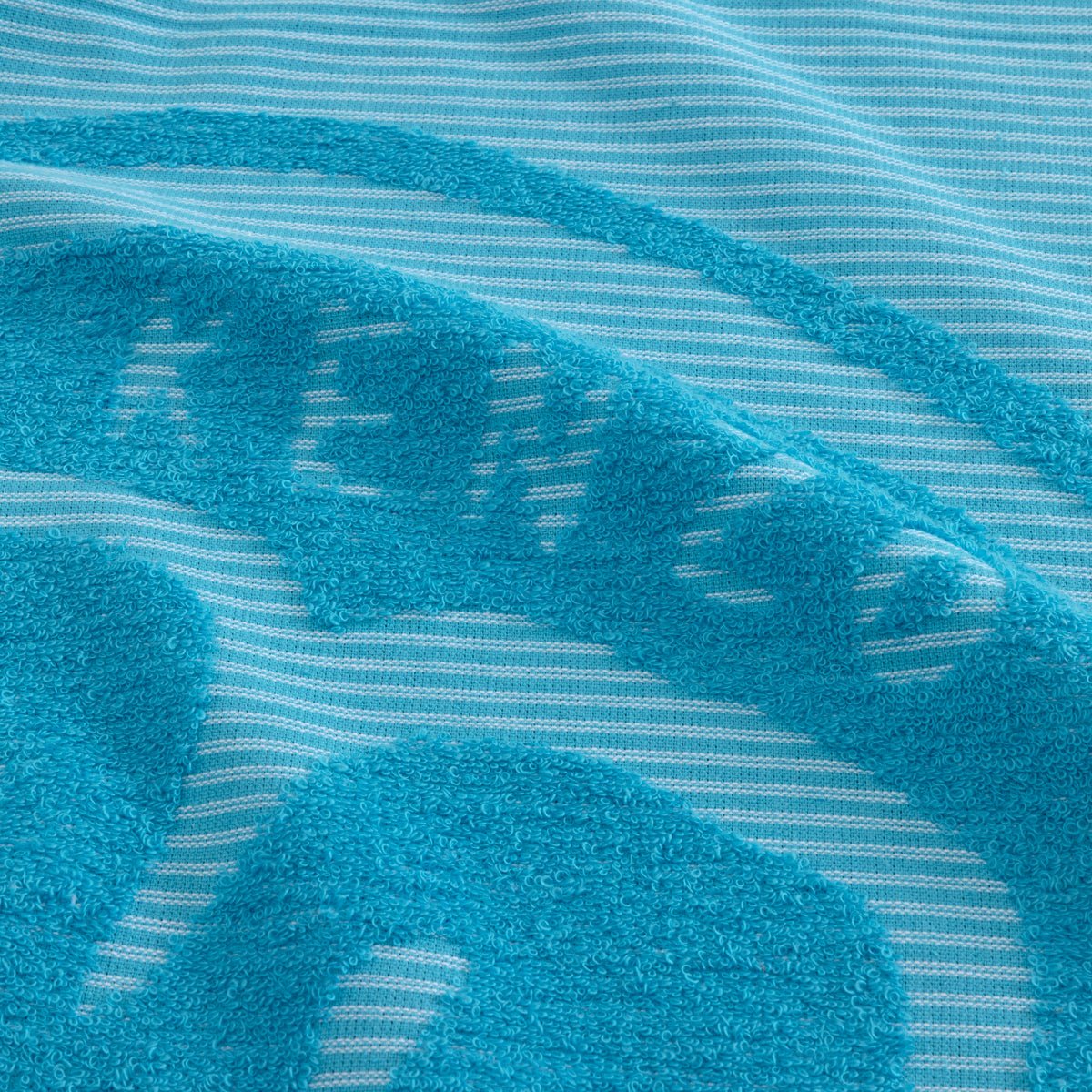 K HEART Turquoise Jacquard Beach Towel by Kenzo Paris | Yves Delorme at Fig Linens and Home 4