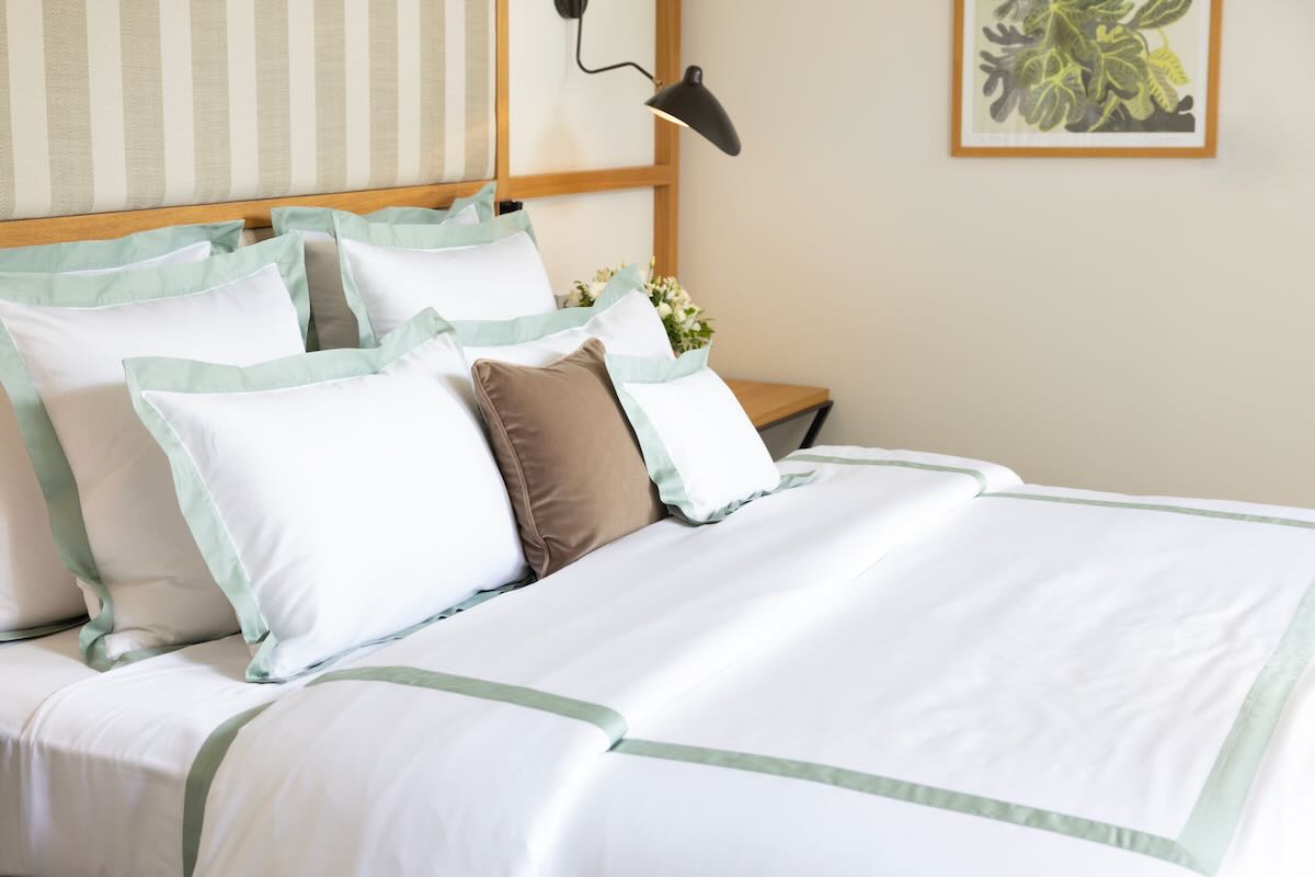 Yves Delorme Linea Veronese Green Organic Cotton Bedding in Luxurious Bedroom
