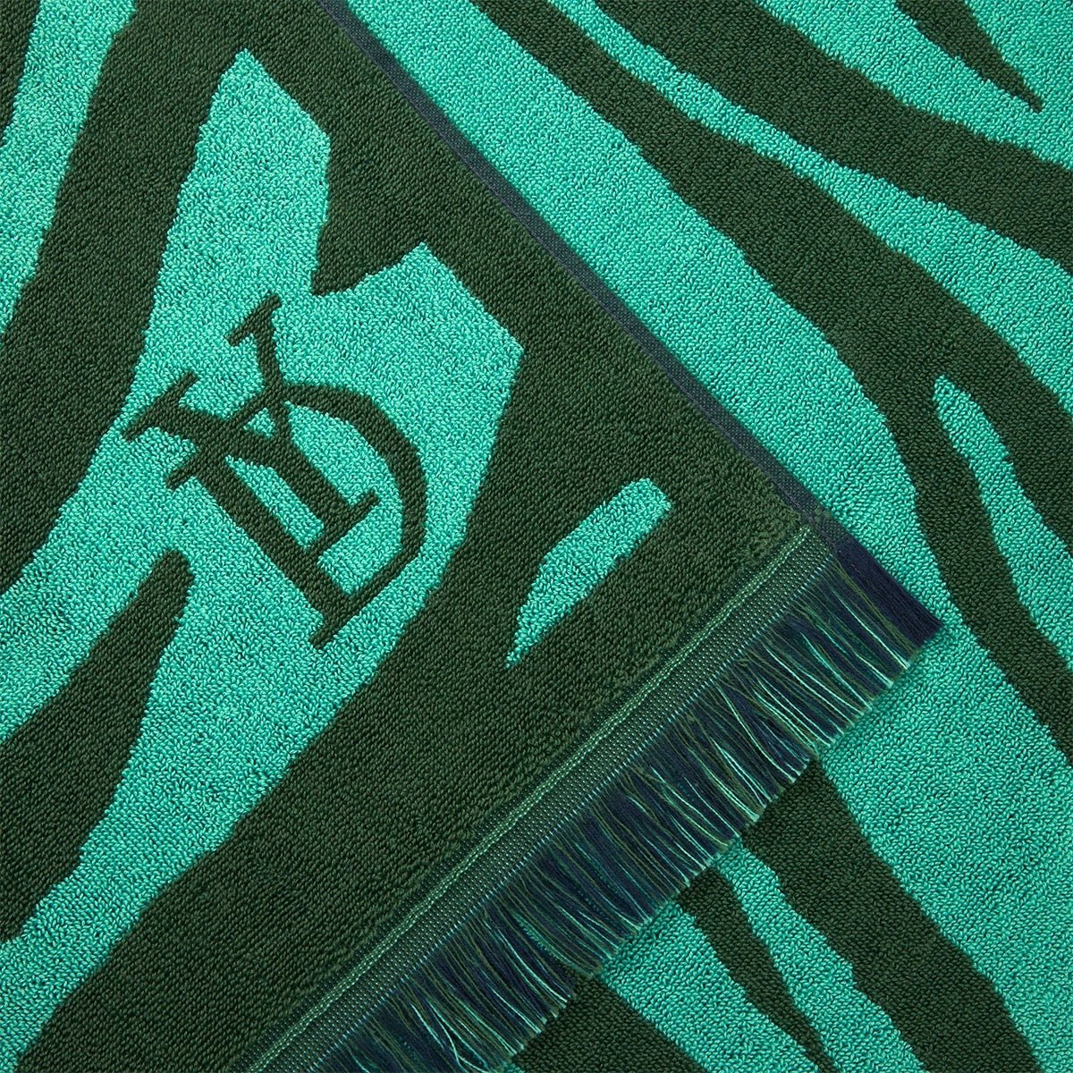 Pampa Menthe Beach Towel by Yves Delorme - Fig Linens and Home Beach & Pool Towels Detail of Logo