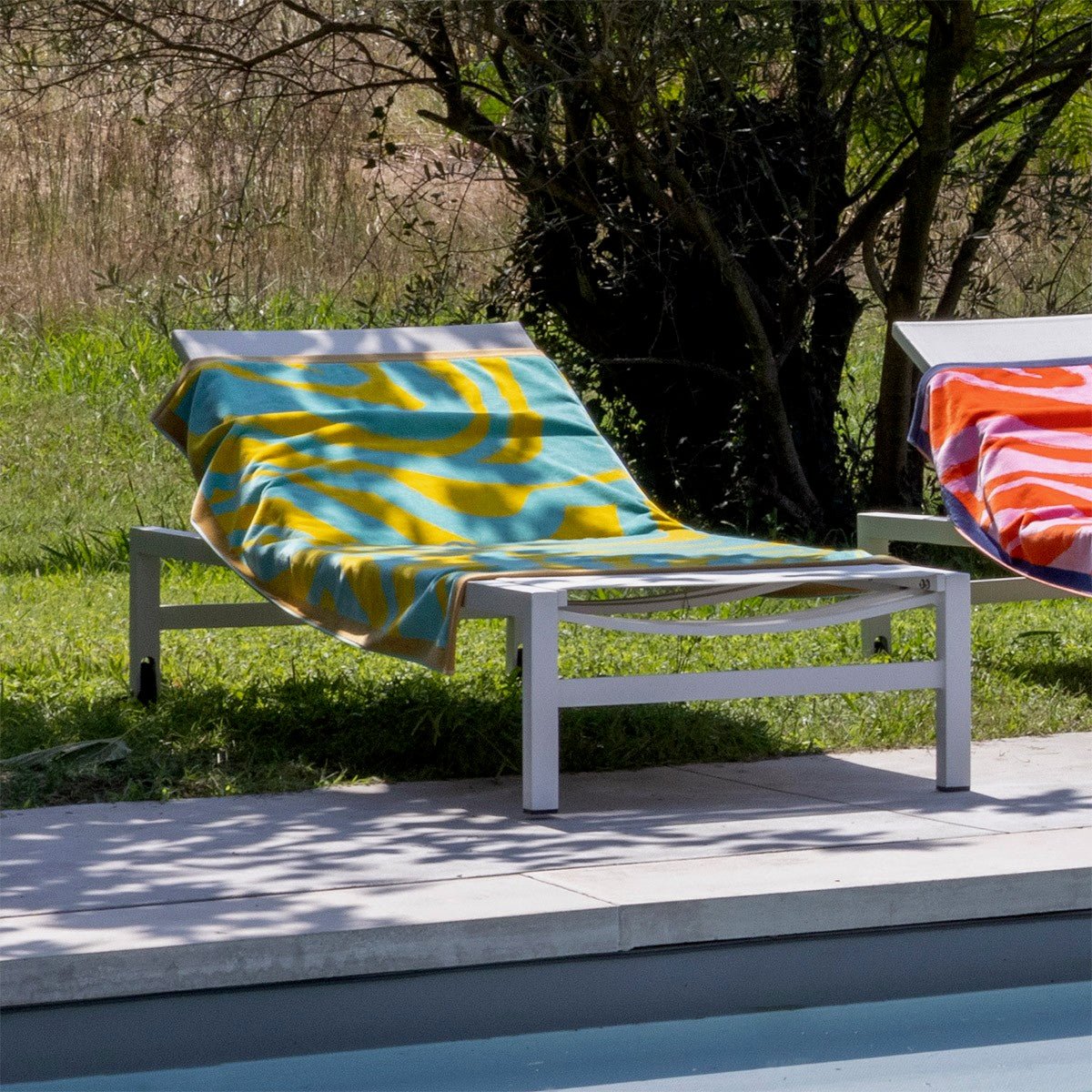 Solaire Jacquard Beach Towel by Yves Delorme at Fig Linens and Home - Lifestyle 1