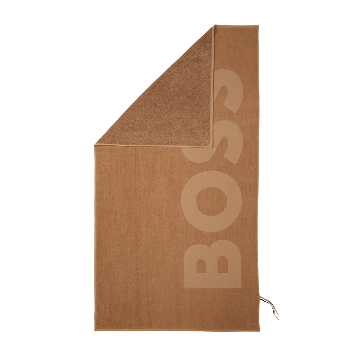 Zuma Sculpted Beach Towel by Hugo Boss Home | Yves Delorme Camel Pool Towel at Fig Linens and Home 1