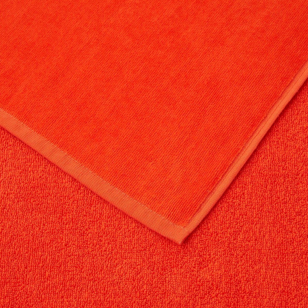 Zuma Sculpted Beach Towel by Hugo Boss Home | Yves Delorme Spice Pool Towel at Fig Linens and Home 4