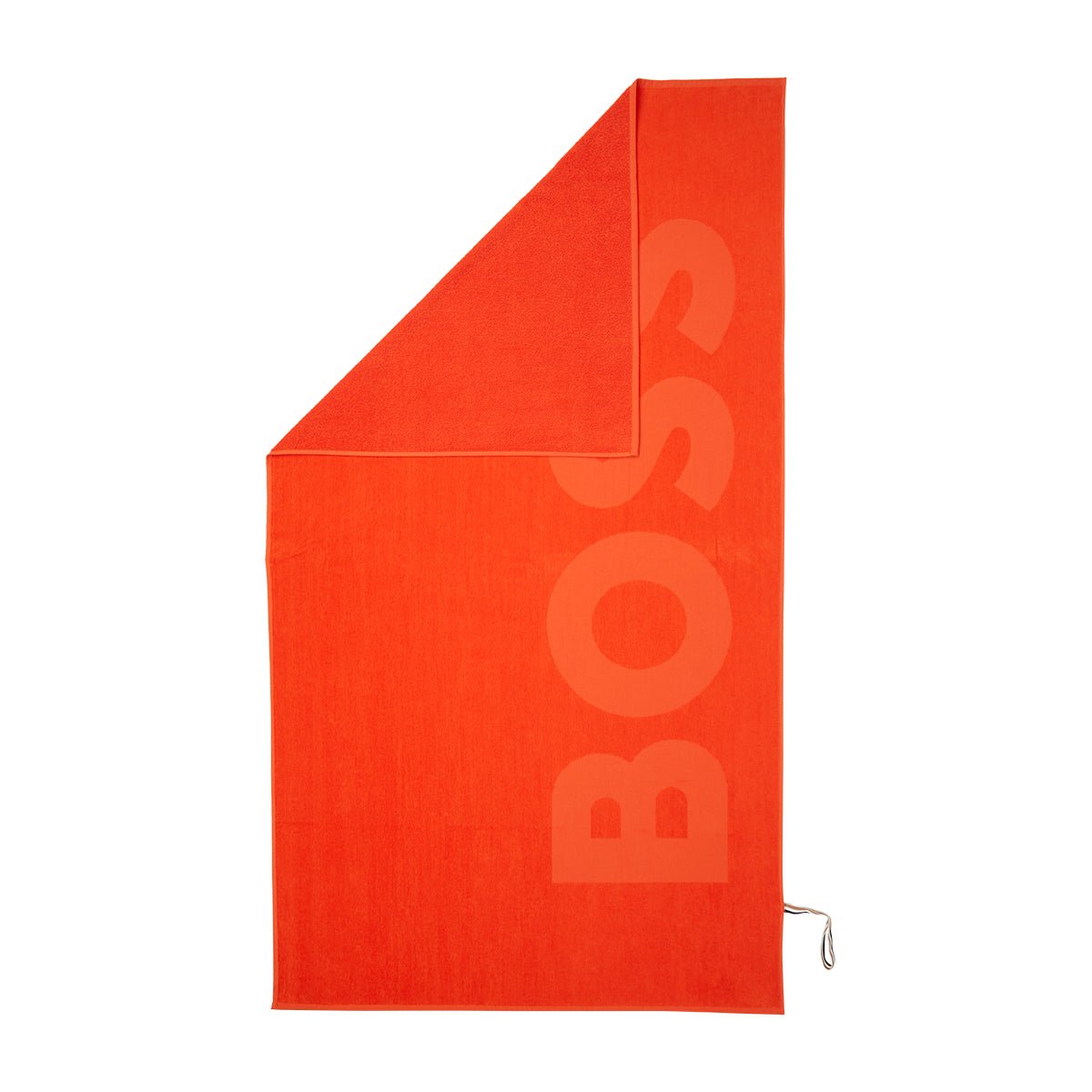 Zuma Sculpted Beach Towel by Hugo Boss Home | Yves Delorme Spice Pool Towel at Fig Linens and Home 1