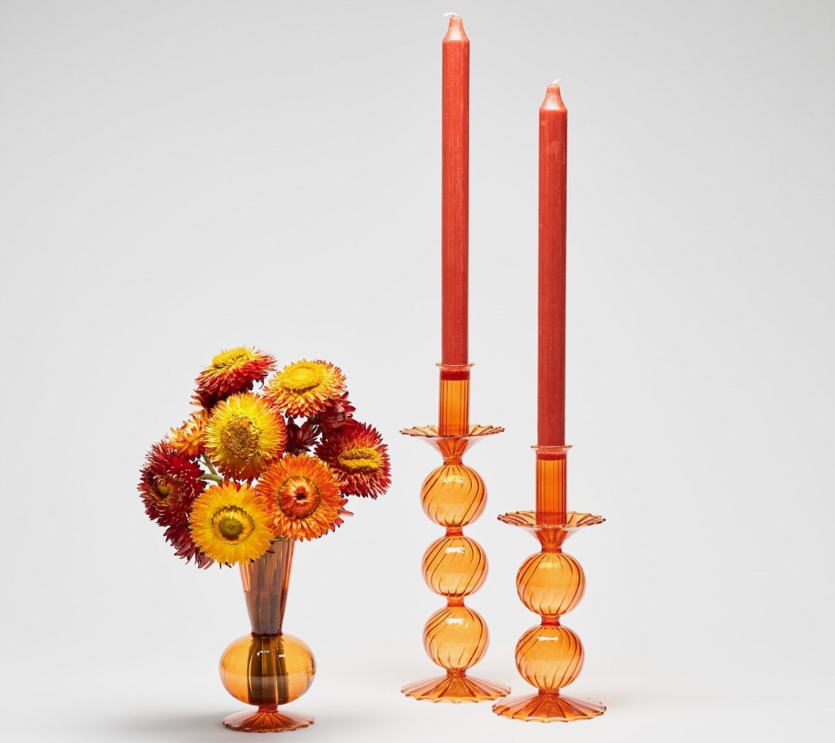 Kim Seybert BUD VASE: TESS S3 - Amber Glass Bud Vases Set at Fig Linens and Home 3 - Shown with Candlesticks