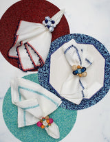 Kim Seybert Jardin Napkin in White & Turquoise Set of 4 by Kim Seybert - WHITE/TURQUOISE 21"L x 21"W x 0.1"H Napkin - Set of 4 at FIG LINENS AND HOME - 6