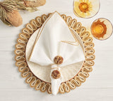 Kim Seybert Casbah Napkin Rings Set of 4 in Natural & Brown by Kim Seybert - Natural/Brown Set of 4 Napkin Rings - 2.1"L x 4"W x 2.8"H at FIG LINENS AND HOME - 3