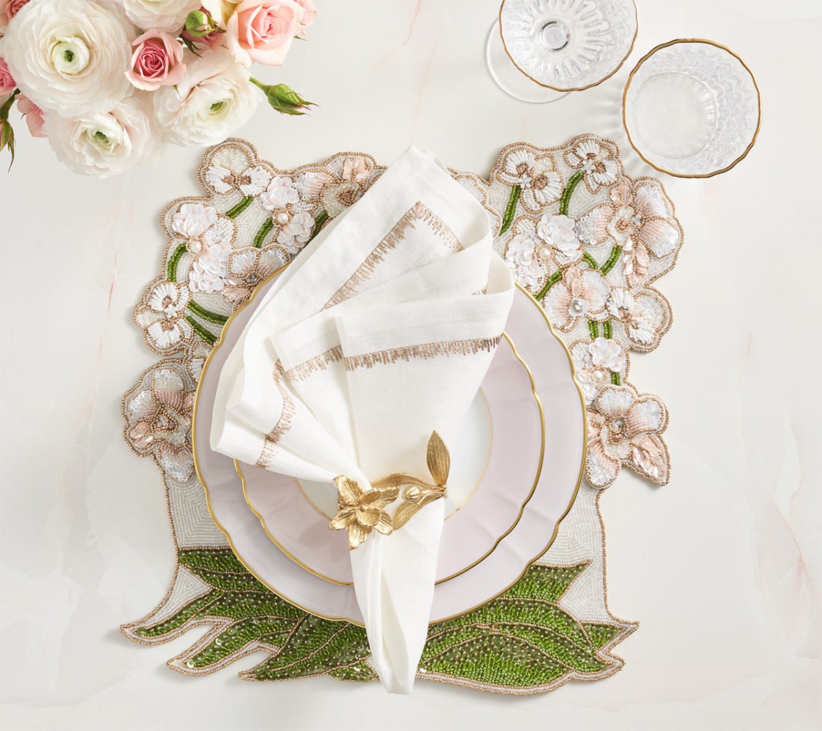 Kim Seybert Orchid Napkin Rings Set of 4 in Gold by Kim Seybert - Gold Set of 4 Napkin Rings - 3.25" L x 2.25" W x 2.3" H at FIG LINENS AND HOME - 2