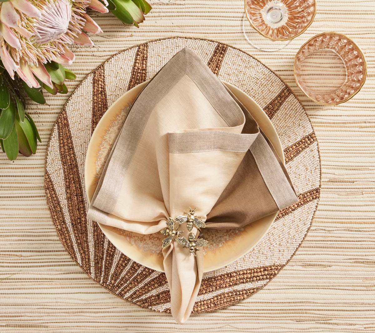 Kim Seybert Placemats Lifestyle View 1 - Royal Palm in Natural & Brown at Fig Linens and Home