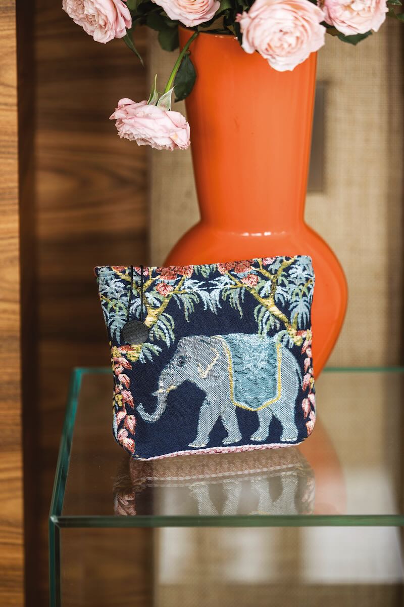 Hannibal Nuit Tote by Yves Delorme - Lifestyle of Pouch with Elephant at Fig Linens and Home 1