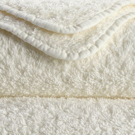 Abyss Super Pile Hand Towel 17x30 Ivory 103 - Swatch at Fig Linens and Home