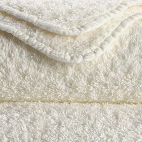Abyss Super Pile Wash Mitt 7x9 Ivory 103 - Swatch at Fig Linens and Home
