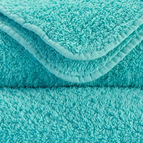 Abyss Super Pile Hand Towel 17x30 Turquoise 370 - Swatch at Fig Linens and Home