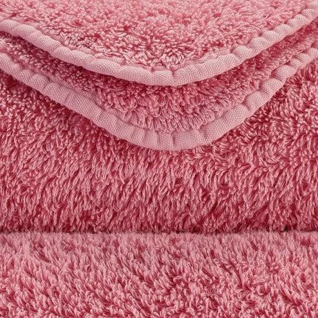 Abyss Super Pile Hand Towel 17x30 Flamingo 573 - Swatch at Fig Linens and Home