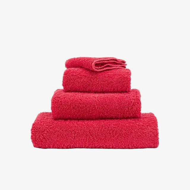 Abyss Super Pile Hand Towel 17x30 Viva Magenta 579 - View 1 at Fig Linens and Home