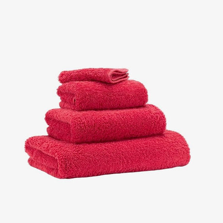 Abyss Super Pile Hand Towel 17x30 Viva Magenta 579 - View 2 at Fig Linens and Home