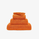 Abyss Super Pile Wash Cloth 12x12 Tangerine 614 - View 1 at Fig Linens and Home