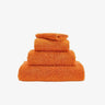 Abyss Super Pile Wash Cloth 12x12 Tangerine 614 - View 1 at Fig Linens and Home
