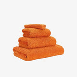 Abyss Super Pile Wash Cloth 12x12 Tangerine 614 - View 2 at Fig Linens and Home