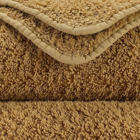 Abyss Super Pile Wash Cloth 12x12 Gold 840 - Swatch at Fig Linens and Home